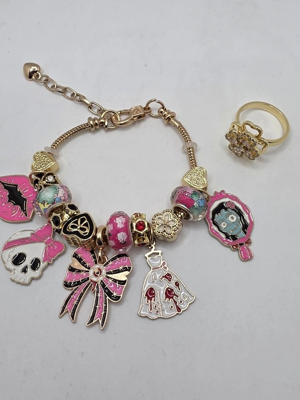 Monster High Pink & Gold Charm Bracelet with Dress, Bow, Skull & Mirror Charms